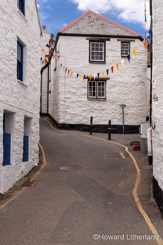 Whitewashed cottages at Gorran Haven on the south Cornish coast, England