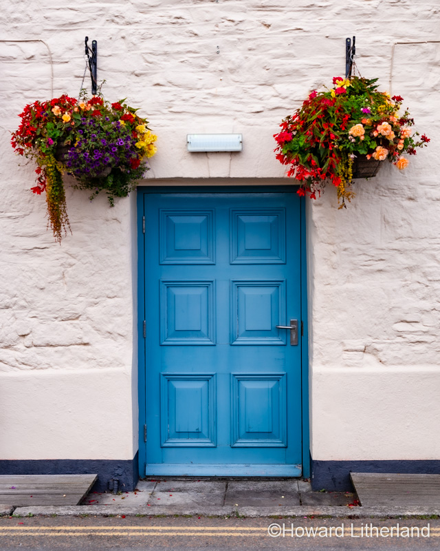 Blue door and flowers, Pentewan, Cornwall