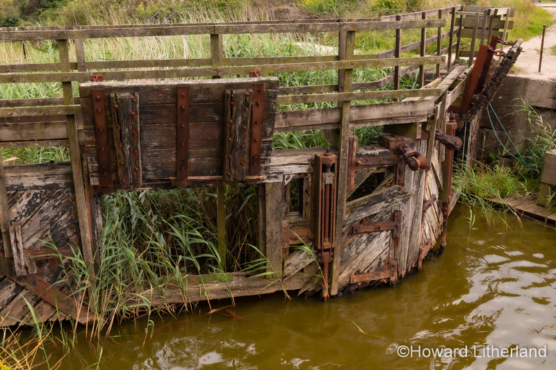 Broken old wooden lock gates at Pentewan, Cornwall