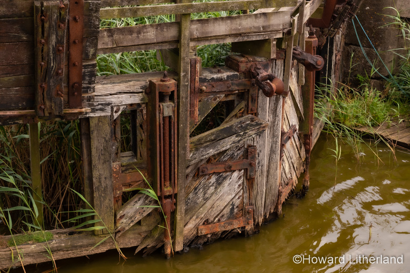 Broken old wooden lock gates at Pentewan, Cornwall