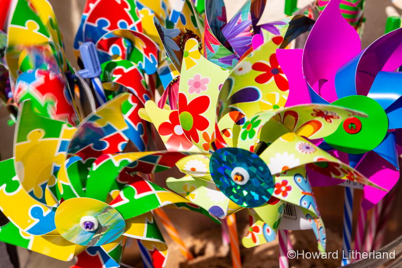 Colourful plastic beach toys for sale at Port Isaac, Cornwall, Enlgand