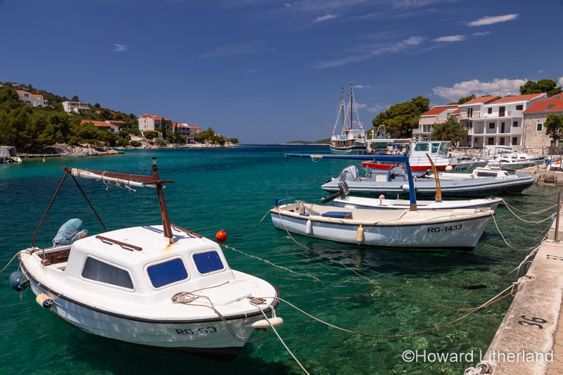 Small boats moored at Razanj harbour on the Adriatic coast of Croatia
