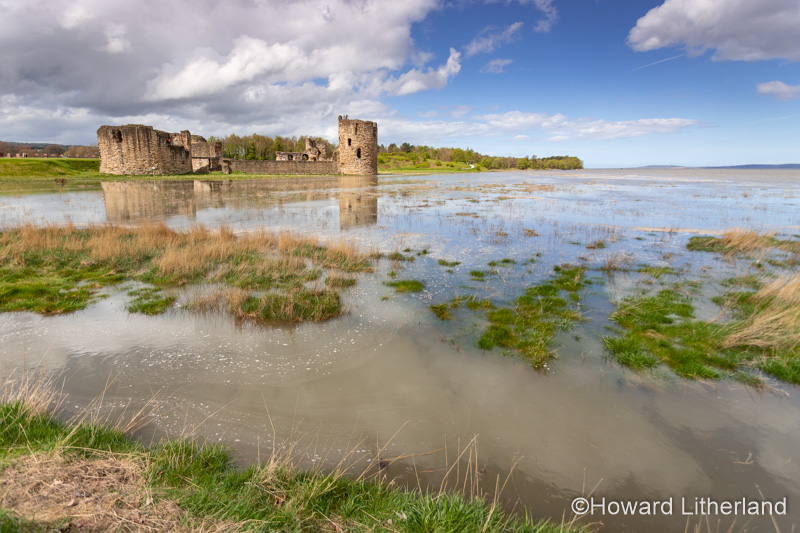 Flint castle at high spring tide, North Wales coast