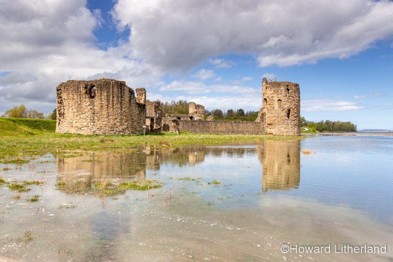 Flint castle at high spring tide, North Wales coast