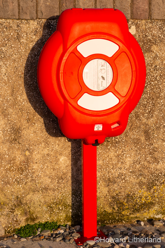 Red lifebelt at Deganwy on the North Wales coast