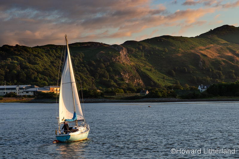 Yacht sailing on the Conwy estuary at Deganwy on the North Wales coast