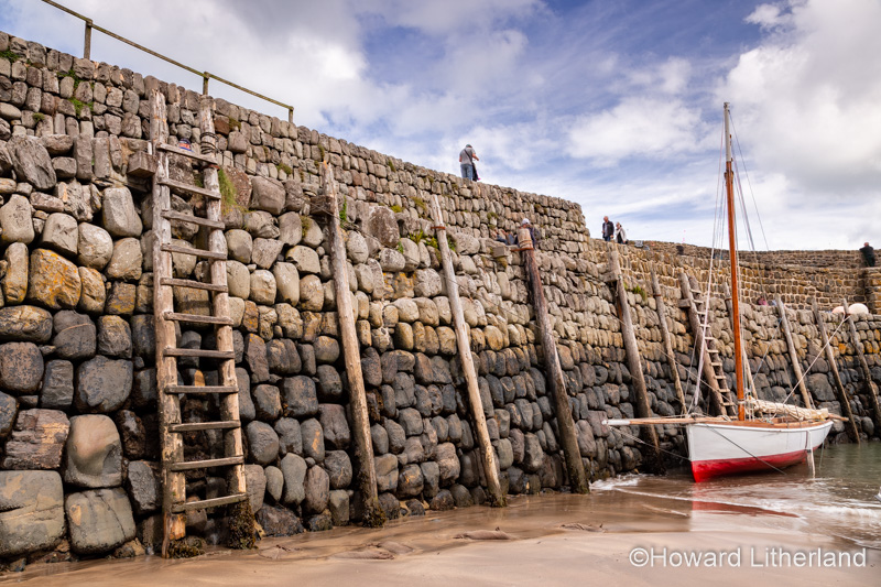 Harbour wall and boat at Clovelly on the North Devon coast