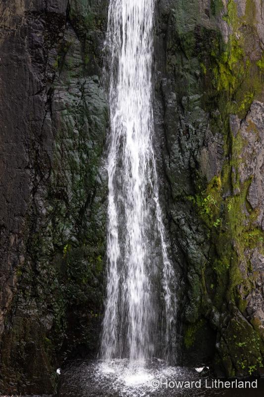 Speke's Mill Mouth waterfall at Hartland Quay, Devon, England