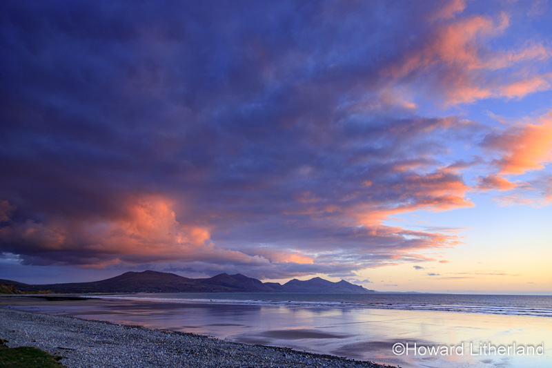 Clouds at dusk over Dinas Dinlle beach, North Wales
