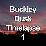 Time lapse of colourful clouds at sunset over an oak tree