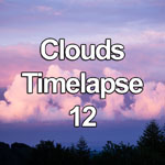 Time lapse video showing a line of cumulus clouds catching the last light of the setting sun, North Wales