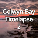 Time lapse video showing dusk falling over Colwyn Bay on the North Wales coast as the streetlights come on