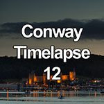 Time lapse video showing dusk and nightfall over Conway Castle on the North Wales coast