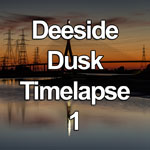 Time lapse video showing a colourful dusk over the Flintshire Suspension Bridge and river Dee estuary, Deeside, North Wales