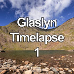 Time lapse video of summer clouds blowing over the waters of Glaslyn, in the Snowdonia National Park, North Wales, with the summit of Snowdon in the background