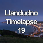 Time lapse video showing the transition from day to night overlooking Llandudno and the Little Orme on the North Wales coast, with streetlights and traffic light trails
