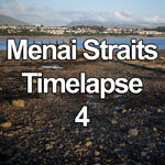 Time lapse video showing the tide coming in over a decaying jetty on the Menai Straits, Anglesey, Wales