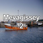 This video show a fishing boat heading out of the harbour at Mevagissey on the south coast of Cornwall on a calm evening