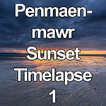 Time lapse of sunset over wet sand at Penmaenmawr, North Wales