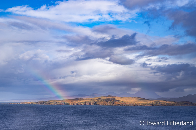 Rainbow over Guinard Island on the Atlantic west coast of Scotland