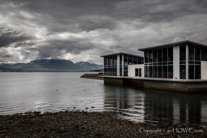 Waterfront building on the side of the Eyjafjordur fjord at Akureyri, Iceland