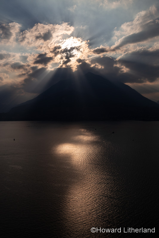 Photo of a dramatic sunset over the centre (Centro Lago) of Lake Como from Varenna in northern Italy