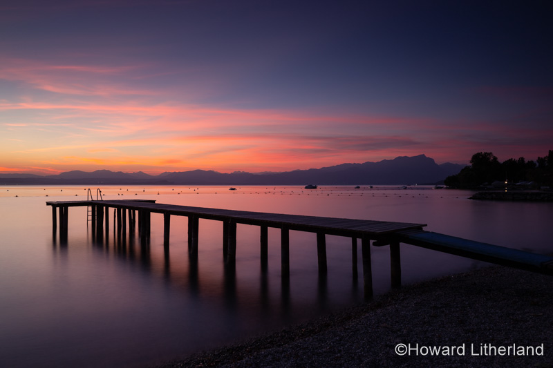 Jetty at dusk at Lazise on the shores of Lake Garda in northern Italy