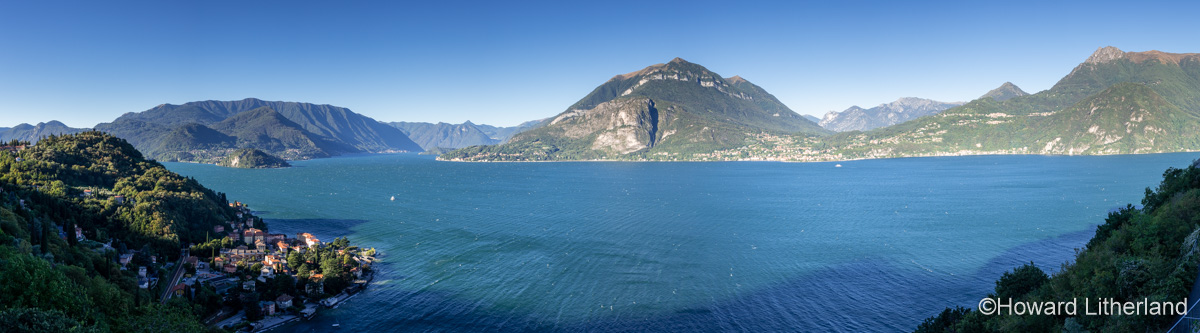 Panoramic image overlooking the centre of Lake Como, Varenna and mountains in northern Italy
