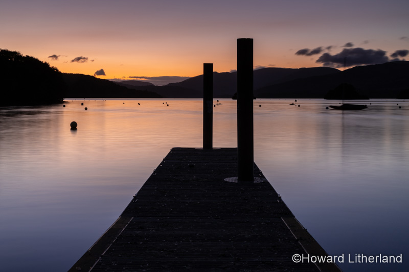 Jetty on Lake Windermere at dusk, Lake District, England
