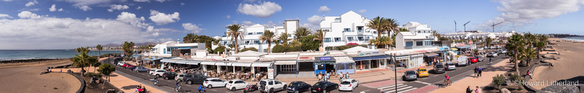Panoramic image of the seaside promenade at Puerto del Carmen on the south coast of Lanzarote in the Canary Islands