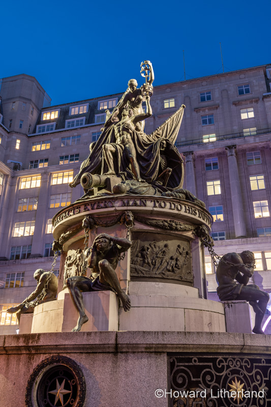Nelson monument at night, Liverpool town hall, England