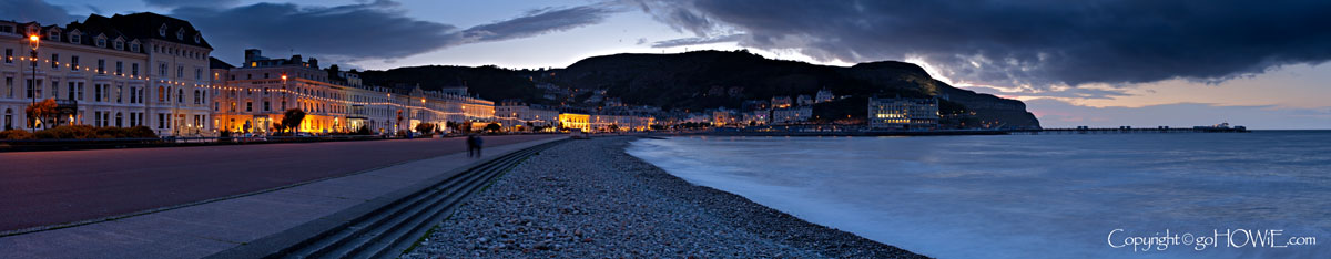 Panoramic stitch photo of Llandudno promenade at night, North Wales