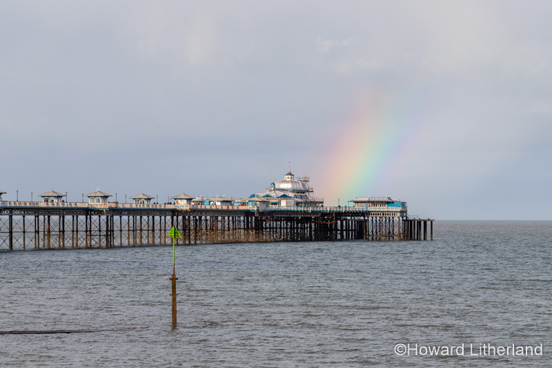 Rainbow over Llandudno Pier on the North Wales coast
