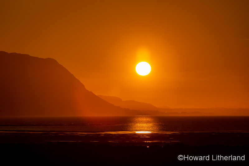 Sunset over the North Wales coast from Llandudno West Shore