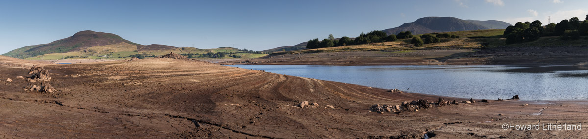 Llyn Celyn reservoir in Snowdonia National Park, North Wales, with low water levels during the drought of summer 2018