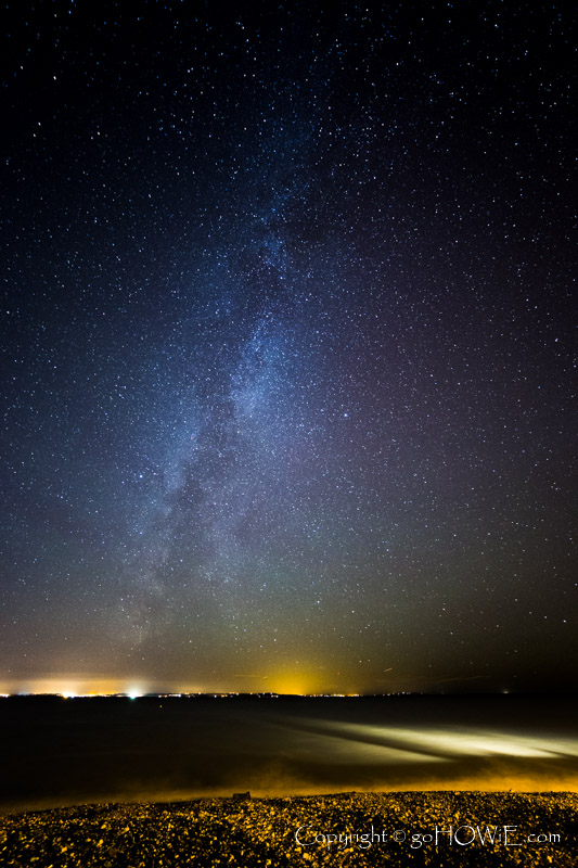 The milky way arching over Colwyn Bay on the North Wales coast