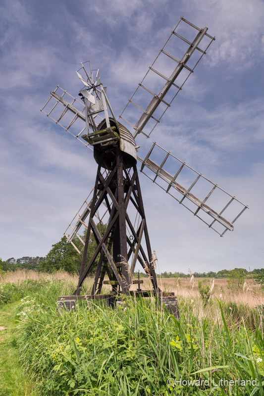 Windmill in a field in the Norfolk Broads, England