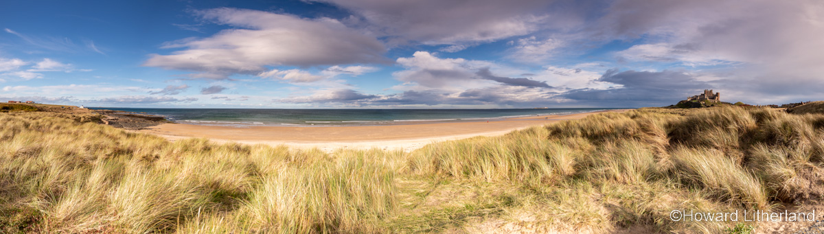 Bamburgh beach and castle on the east coast of Northumberland, England