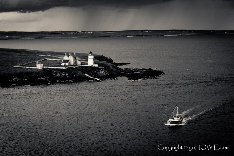 Lighthouse and pilot boat, Orkney Islands, Scotland