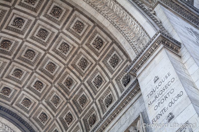 Ornate stone carving on the Arc de Triomphe, Paris, France