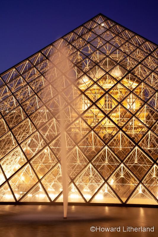 Courtyard of the Louvre, Paris, France, at dusk