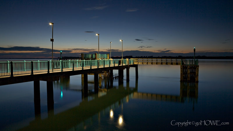 The pier at Victoria Dock at dusk, Caernarfon on the North Wales coast