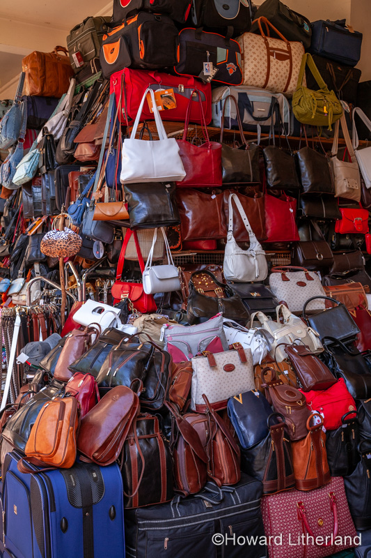 Display of handbags in Funchal market, Madeira, Portugal
