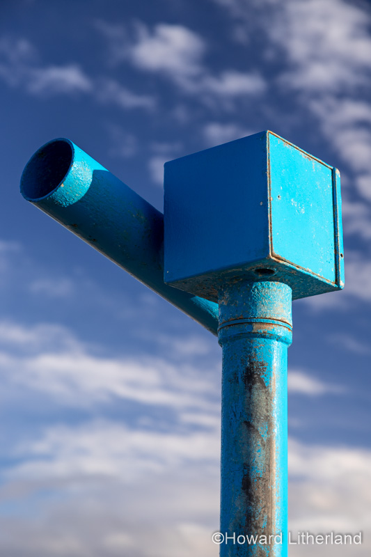 Blue seaside telescope at Prestatyn, North Wales