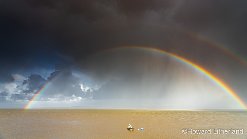 Double rainbow over the river Dee estuary on the North Wales coast