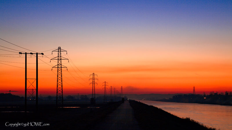 Photo of pylons by the river Dee just before sunrise at Queensferry, North Wales