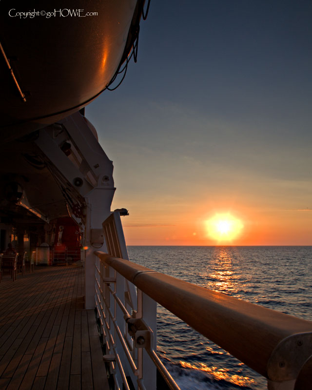 The promenade deck of P&O liner Arcadia at sunset