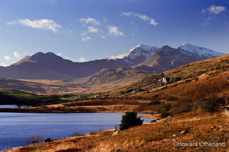 Snow capped Snowdon Horseshoe mountain range and Llyn Mymbyr in the Snowdonia National Park, North Wales