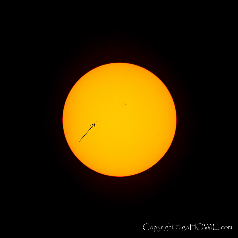 Photo showing the tiny planet Mercury superimposed on the face of the sun during its 2016 transit