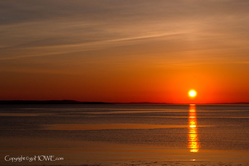 Sunset over the Conwy estuary at Llandudno West Shore, North Wales coast